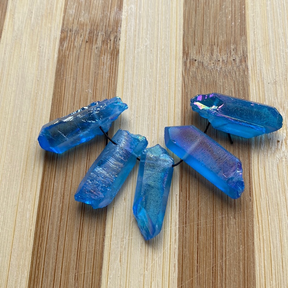 Light blue Mystic crystals drilled